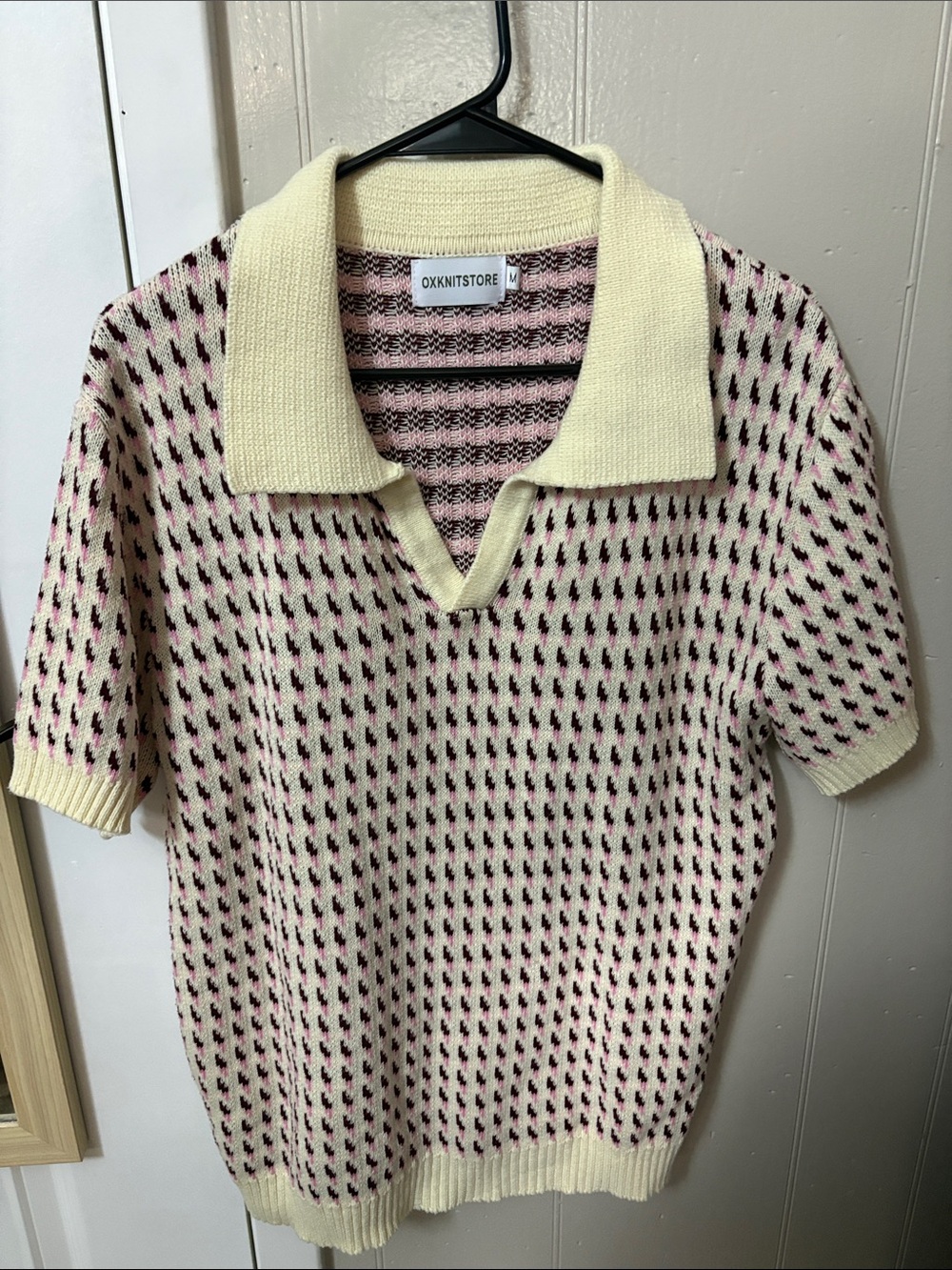 Amazon Cream Knit V‑Neck Polo Sweater with Pink and Black Dot Pattern